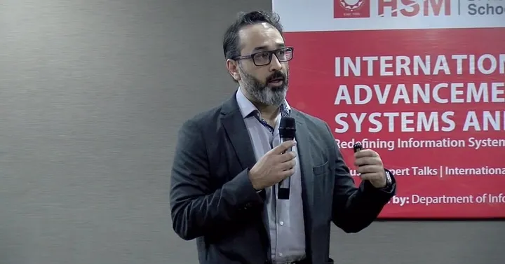 Umar Rana speaking at ICAISAI'26 at HSM, UMT